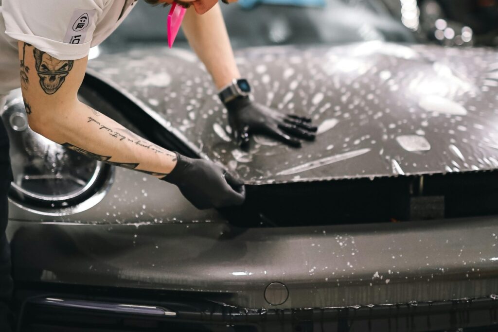 Man applying paint protection film